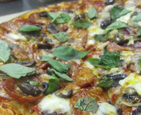 Mezzadellas Woodfired Pizza And Tapas - Accommodation Cairns 0