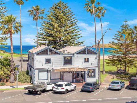 Bathers At The Beach Across From Surf Beach - Accommodation Cairns 2