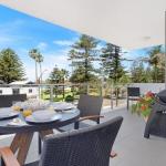Bathers At The Beach Across From Surf Beach - Accommodation Cairns 0