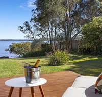 Braeside - waterfront fireplace - Accommodation Cairns