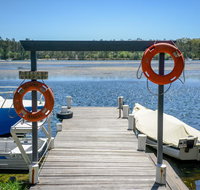 Calm Waters Waterfront Cottages - Accommodation Cairns